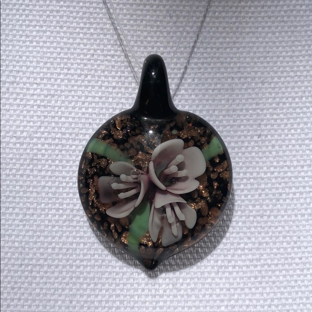 Purple flower with gold glass pendant